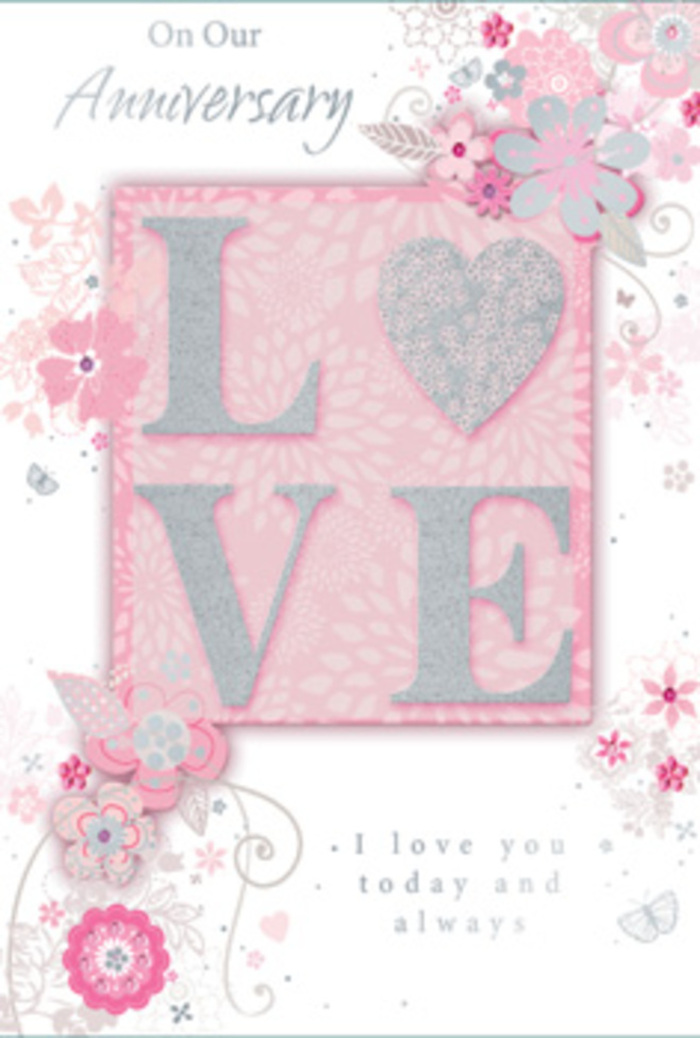 This anniversary card opens to reveal a scene that feels as tranquil and affectionate as a peaceful walk through Valentines Park in Ilford on a bright morning. Dominating the centre is the word LOVE, rendered in bold yet graceful letters coated with frosted glitter that scatters light in soft, shifting sparkles. The raised lettering provides a pleasing textural contrast to the smooth, blush-toned background, encouraging the fingertips to trace each contour as if retracing shared memories. Framing this central motif, wispy, hand-drawn blossoms drift along the card's edges, their petals shaded in gentle pinks, lilacs, and ivory. The blooms cluster and unfurl like a hand-tied bouquet laid along the side of a dining table, with delicate sprays and slim leaves stretching outward in relaxed arcs. Fine filigree lines swirl between the flowers, and tiny, almost-hidden butterflies are tucked among the petals, giving a sense of quiet movement, like a soft breeze flowing through Ilford's garden terraces. The background transitions subtly in tone, from pale blush to softly muted rose, suggesting a glow that feels warm and intimate. Nestled within this floral frame is the message I love you today and always, set in restrained, elegant type that complements rather than competes with the artwork. The overall impression is of something lovingly composed, the way an experienced florist at Flower Delivery Ilford might layer blooms and foliage to achieve perfect balance. This card feels like a bouquet preserved on paper, ideal to accompany an anniversary flower delivery across Ilford and to be treasured long after the petals have faded.